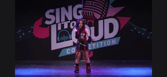 Audrey takes first place — and earns the nickname "Rock Chick"